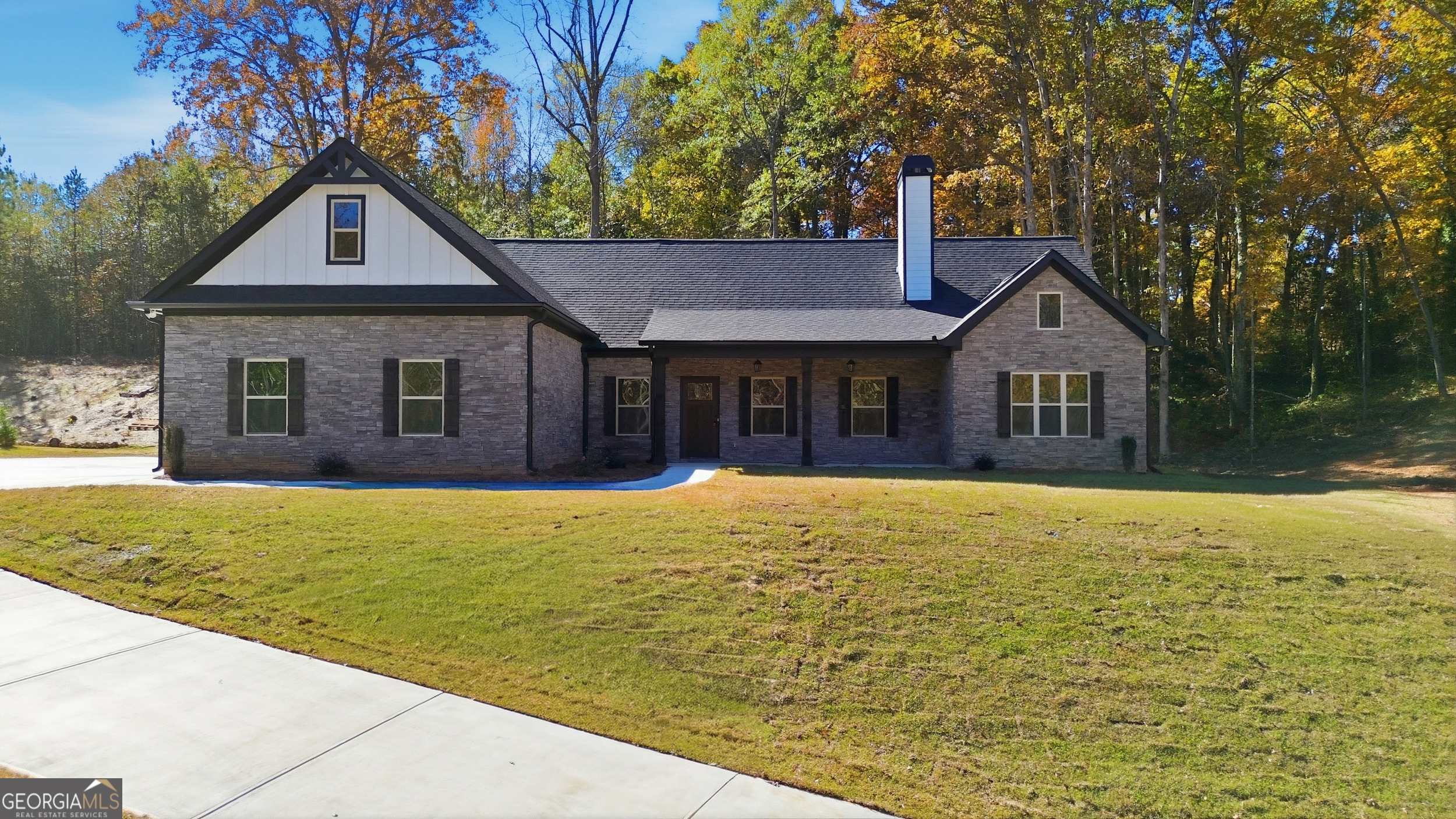 405 Ayers Creek Drive Toccoa, GA 30577 - Photo 4 of 35 a front view of a house with yard and green space