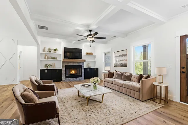 a view of an empty room with a fireplace