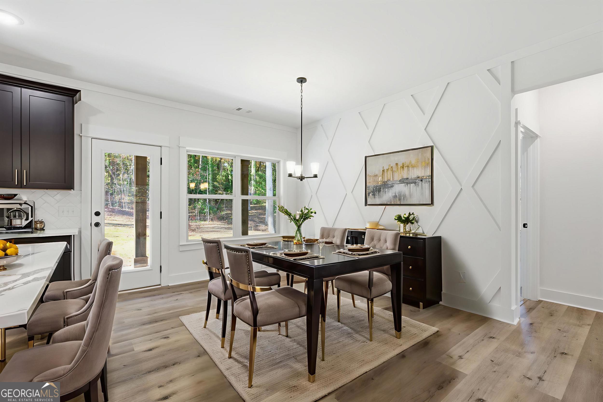 405 Ayers Creek Drive Toccoa, GA 30577 - Photo 9 of 35 a view of a dining room with furniture window and wooden floor