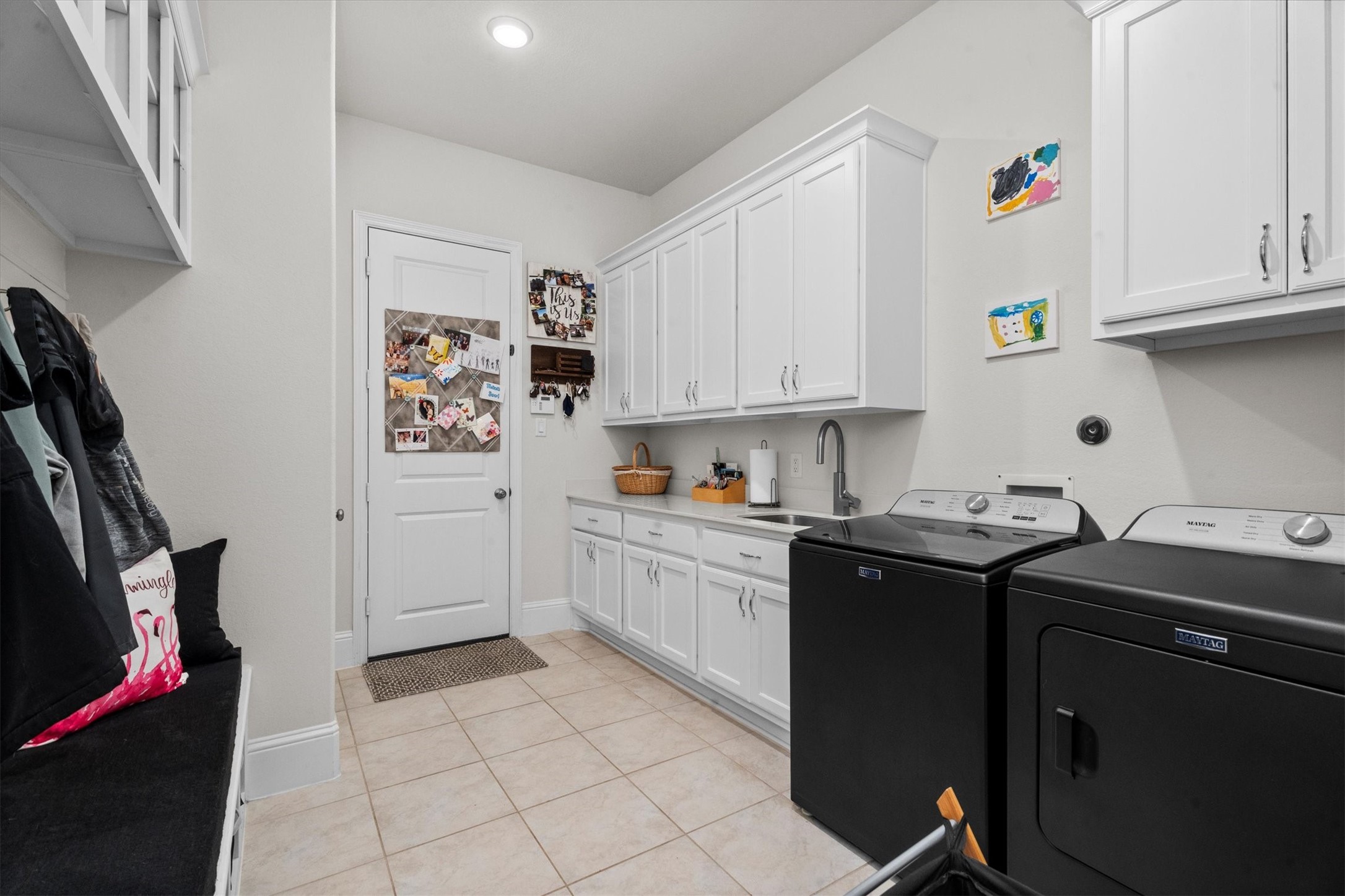 106 Amber Jade Court Conroe, TX 77304 - Photo 23 of 50 a kitchen with stainless steel appliances granite countertop a sink stove and cabinets
