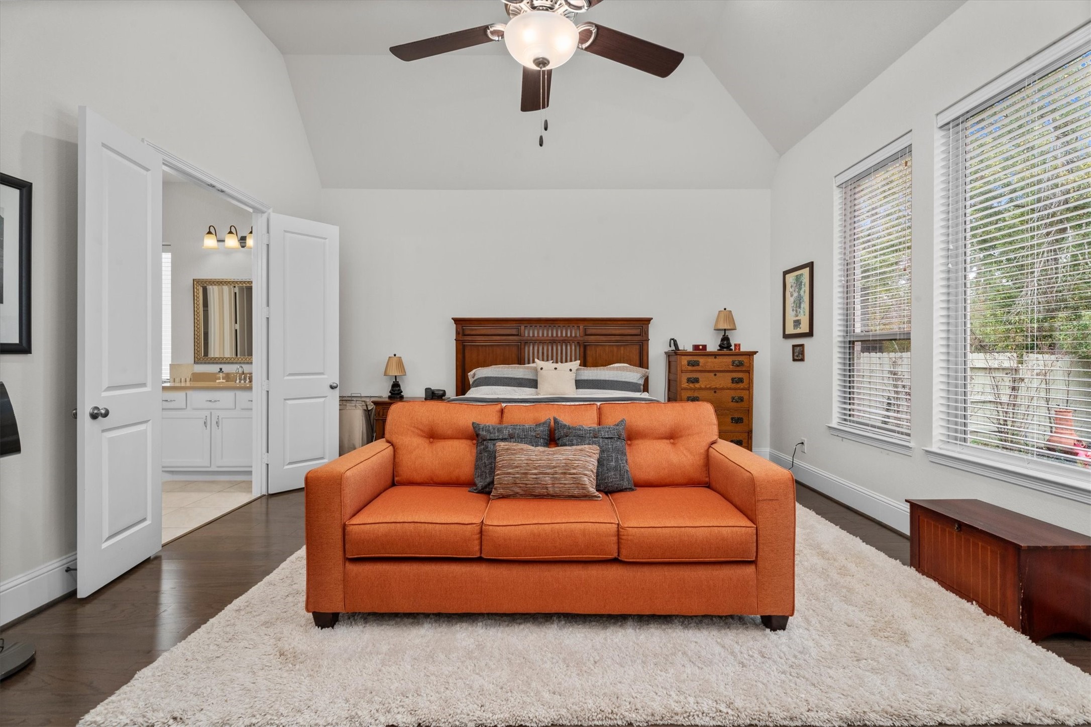 106 Amber Jade Court Conroe, TX 77304 - Photo 26 of 50 a bedroom with furniture and a window