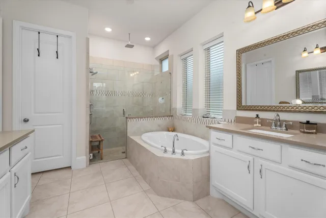 a view of a house with a backyard porch and sitting area