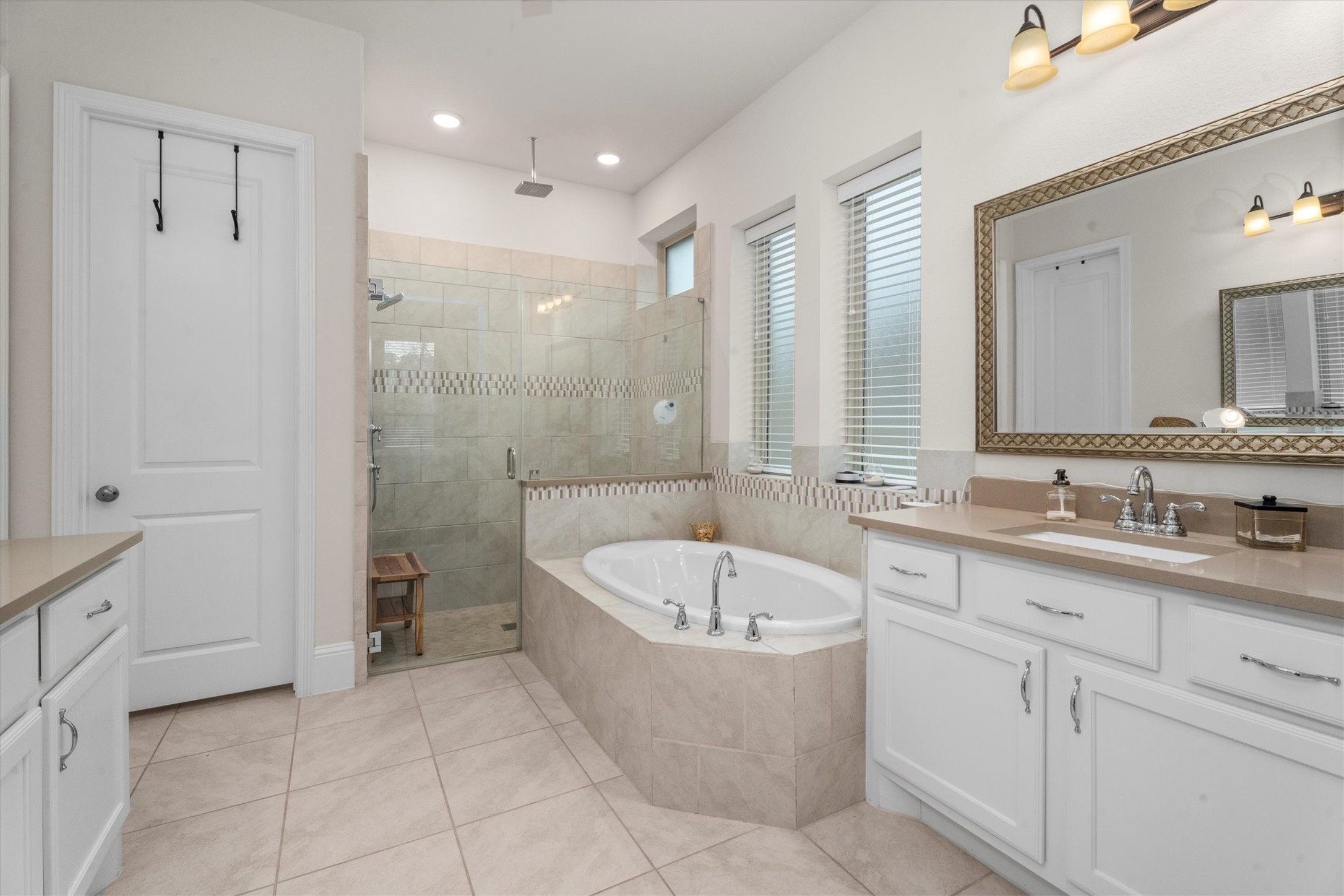 106 Amber Jade Court Conroe, TX 77304 - Photo 31 of 50 Frameless glass shower, rain shower head on separate control and shower niche