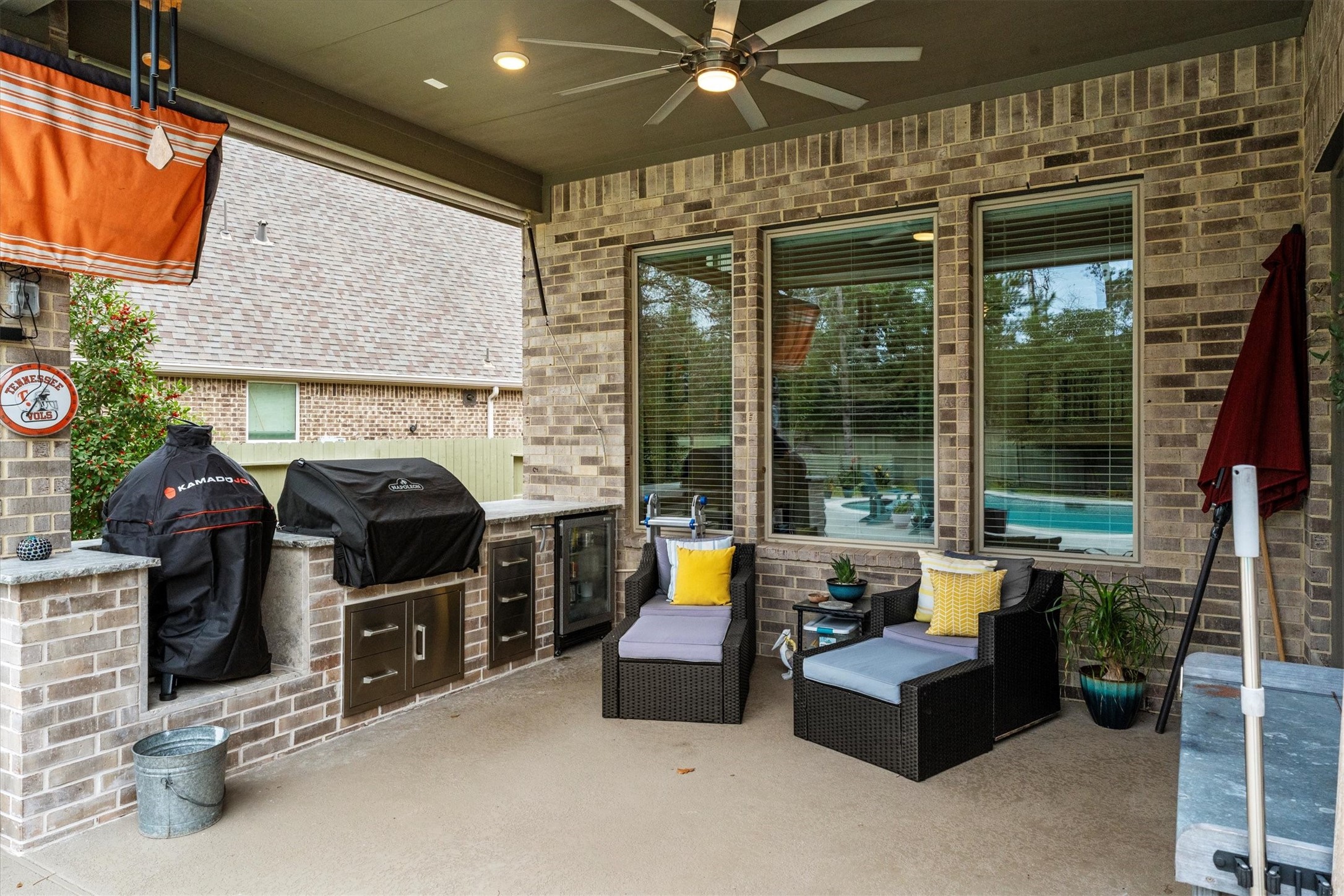106 Amber Jade Court Conroe, TX 77304 - Photo 32 of 50 a living room with fireplace furniture and a large window