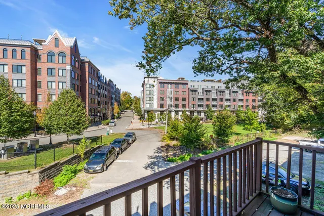 a view of a street from a balcony