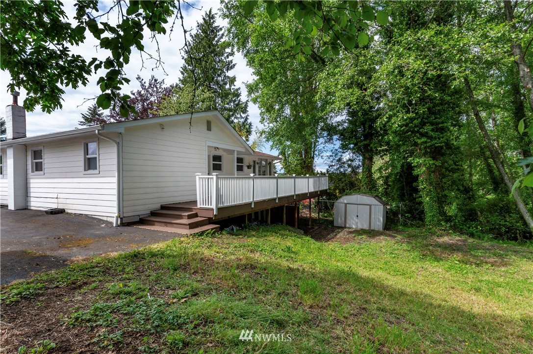 2107 Crystal Springs Road University Place, WA 98466 - Photo 18 of 23 a view of a house with backyard and sitting area