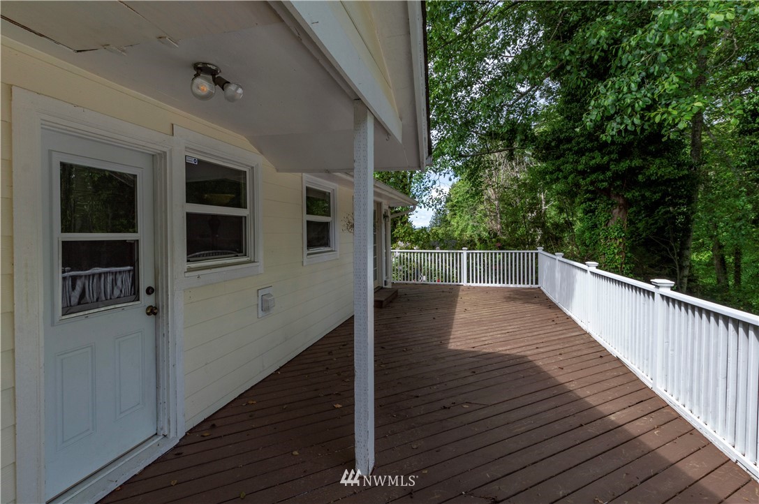 2107 Crystal Springs Road University Place, WA 98466 - Photo 23 of 23 a view of balcony with wooden floor and fence