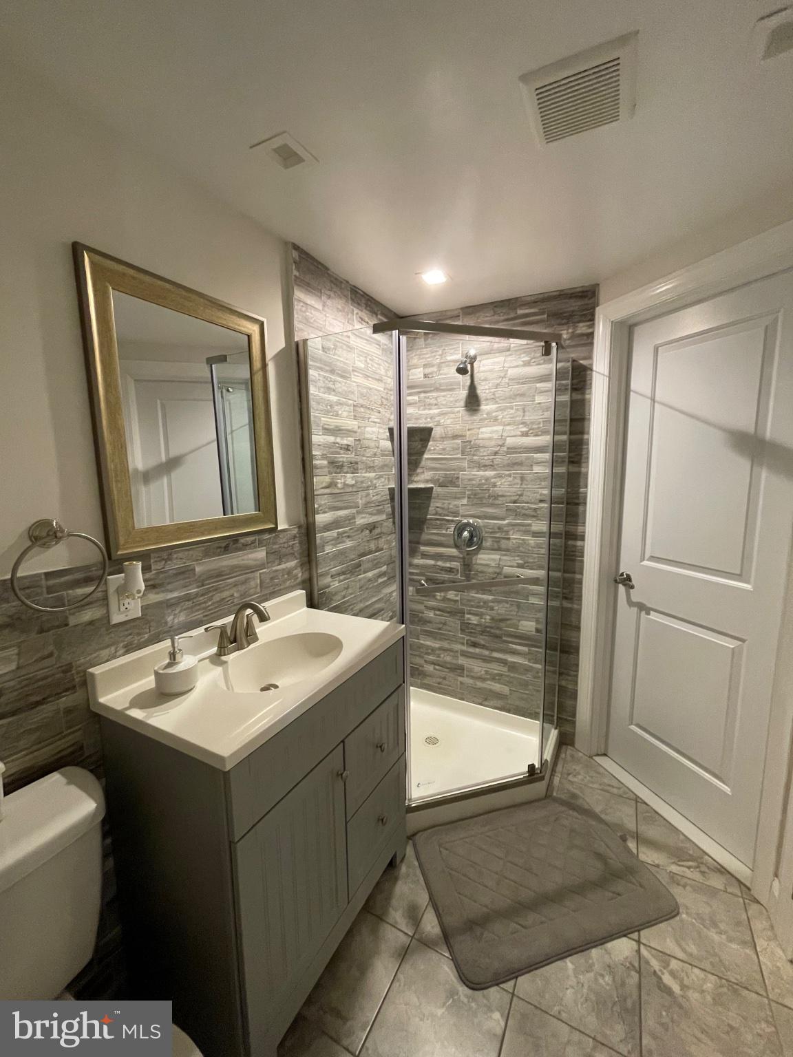 8129 Pine Road Philadelphia, PA 19111 - Photo 24 of 40 Modern bathroom with sleek finishes.