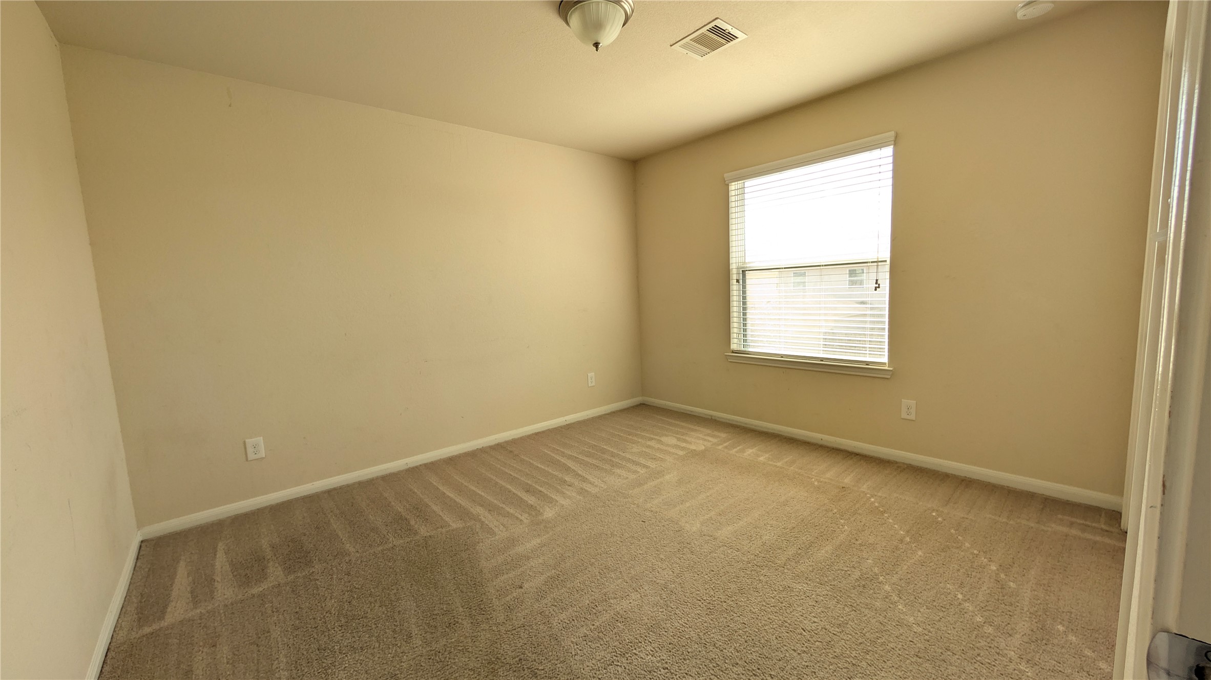 7326 Granite Terrace Lane Houston, TX 77083 - Photo 19 of 39 an empty room with a window