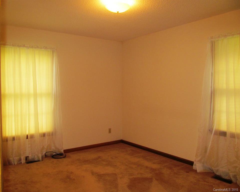 205 Timberfield Trail, Unit 76 China Grove, NC 28023 - Photo 7 of 8 an empty room with a window