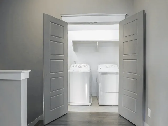 a bathroom with a shower and toilet
