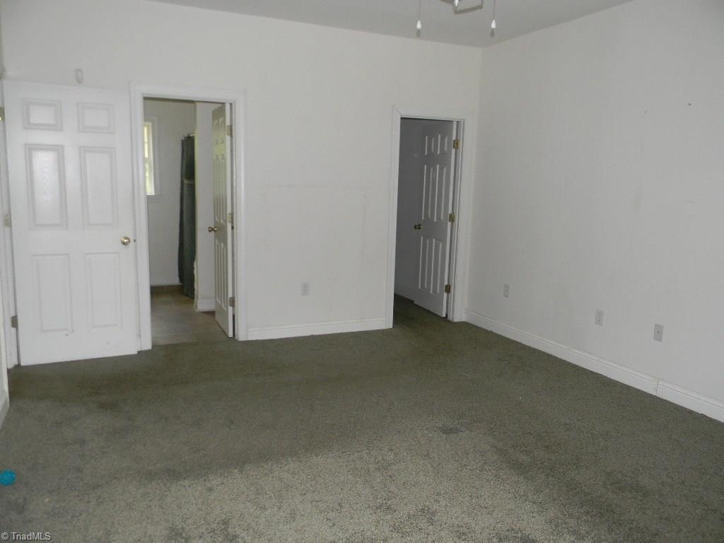 7640 Salem Chapel Road Walnut Cove, NC 27052 - Photo 6 of 15 Master Bedroom toward Master Bath and Walk-in Closet