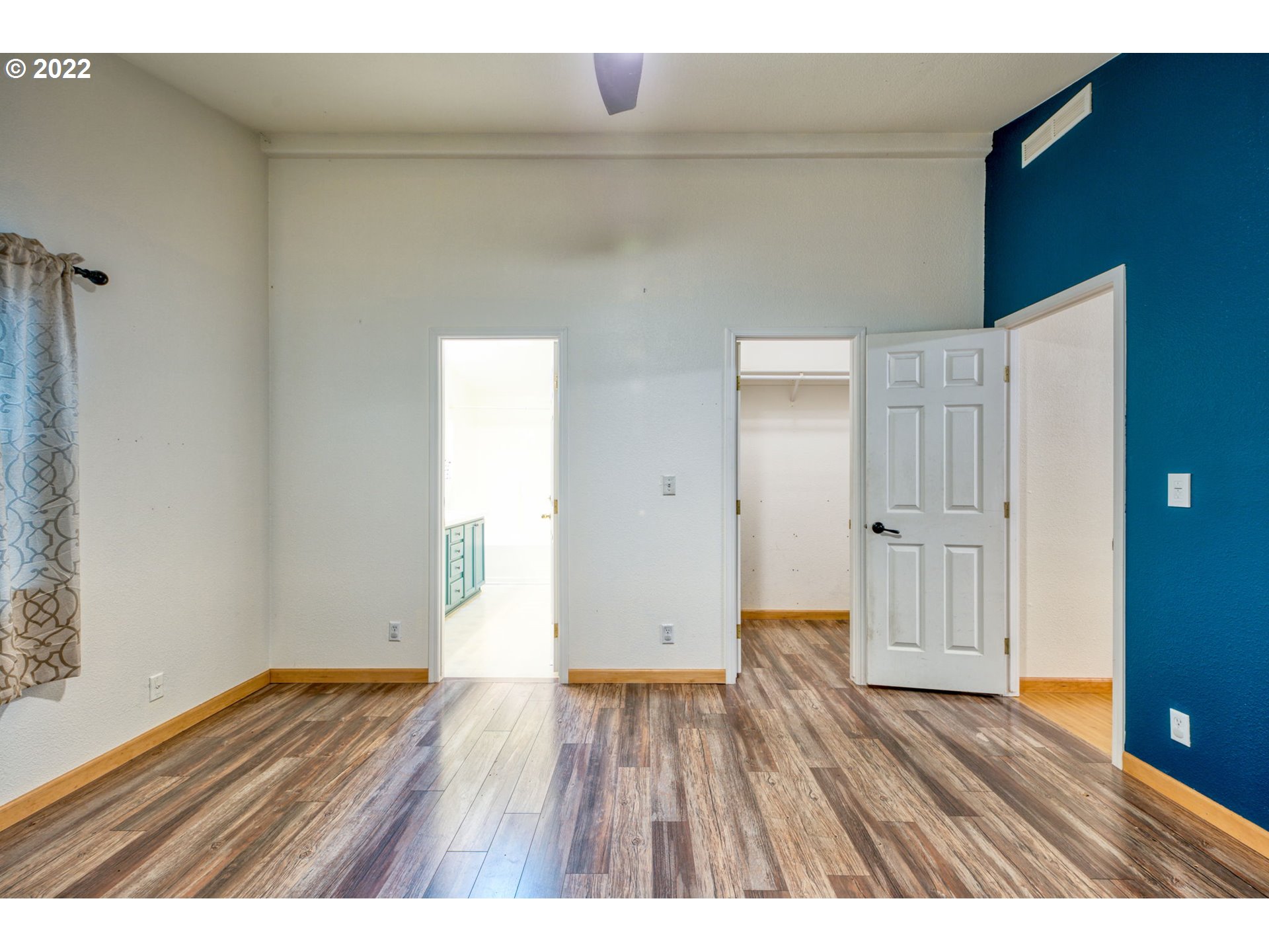 82226 Rattlesnake Road Dexter, OR 97431 - Photo 17 of 32 a view of an empty room with wooden floor and closet