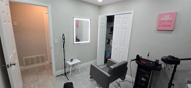 a view of a hallway with couch