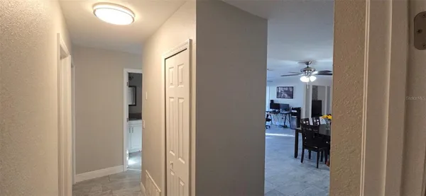 a view of a livingroom with storage & utility room