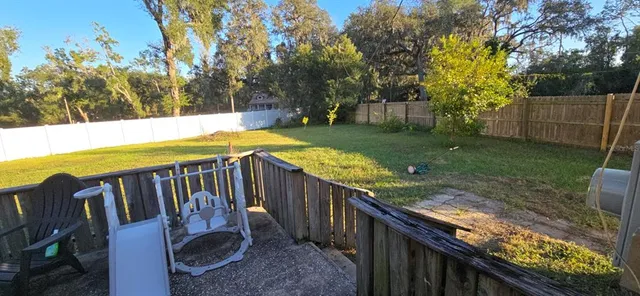 a view of swimming pool from a balcony