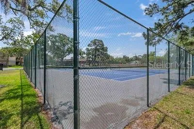 a outdoor space with lots of tables and chairs
