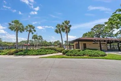 a front view of a building with garden