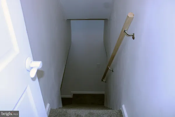 an empty room with closet area