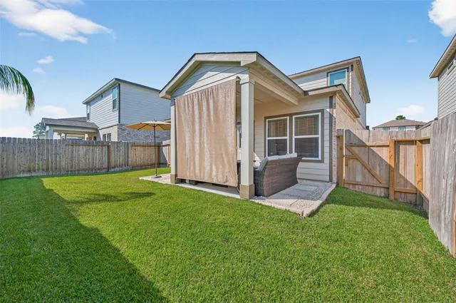 a house view with a garden space