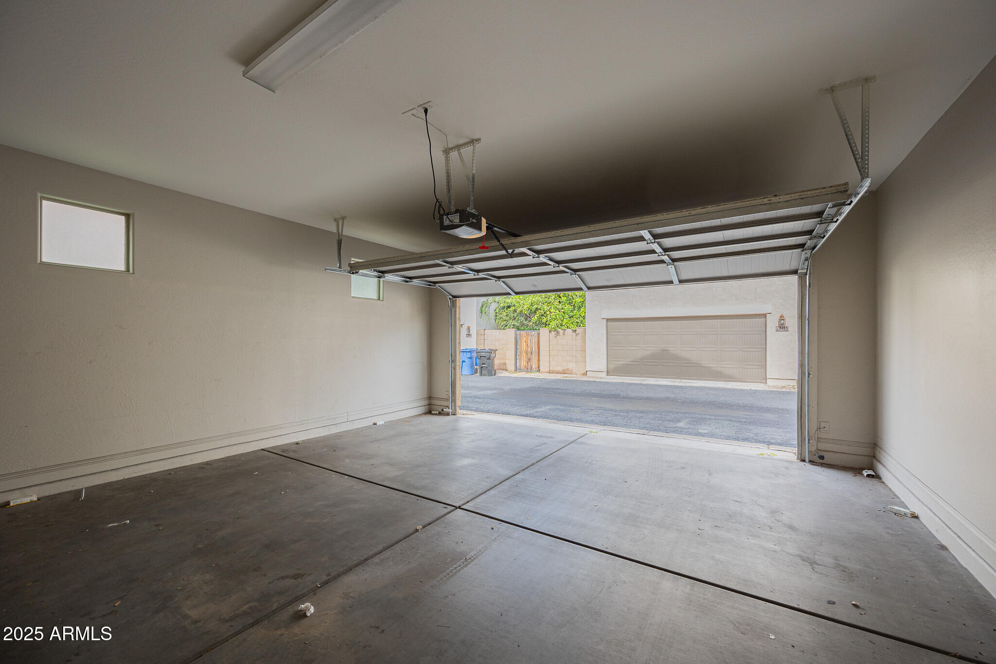 3314 East Sheffield Road Gilbert, AZ 85296 - Photo 26 of 31 a view of an empty room with a window