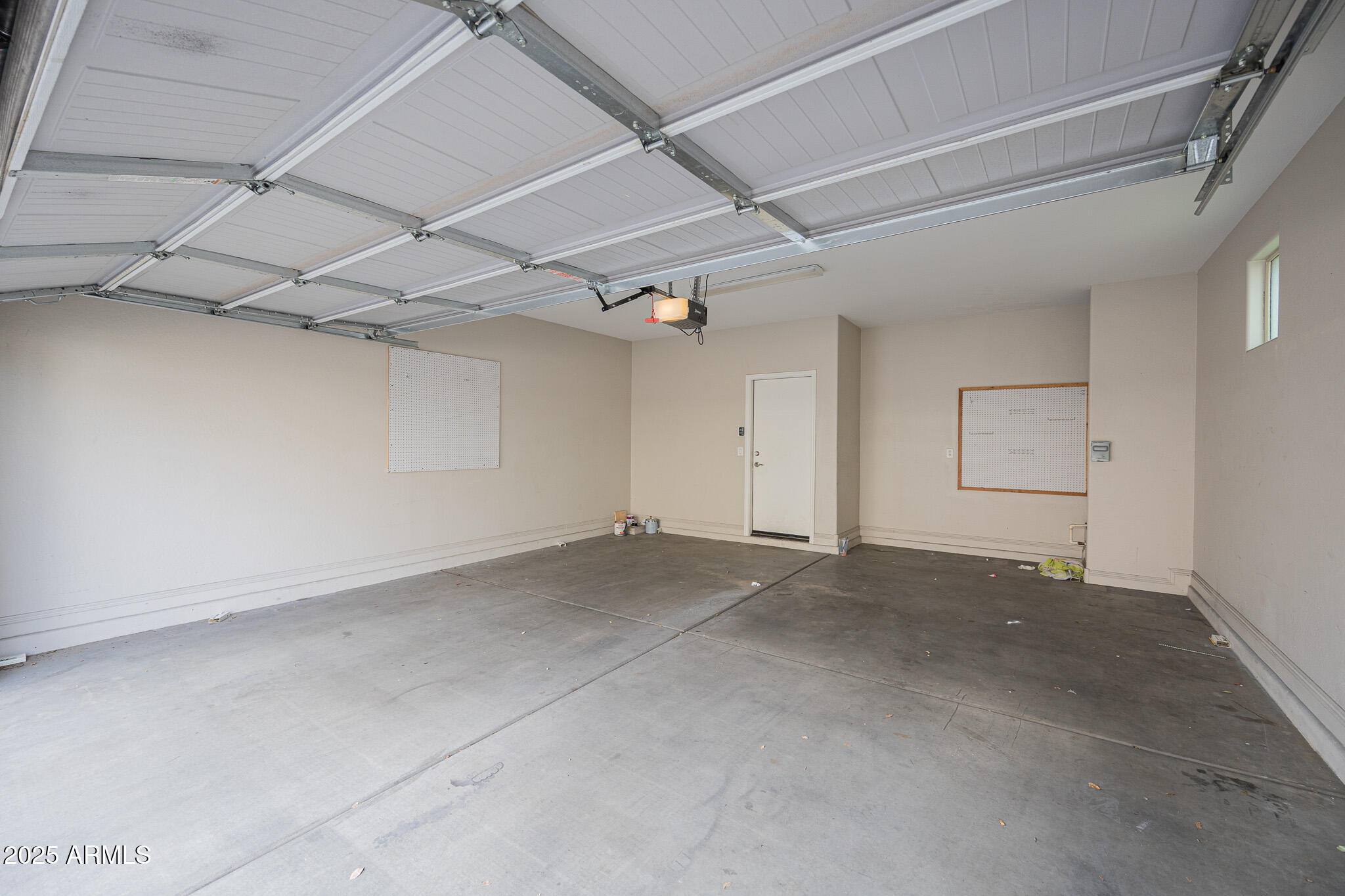 3314 East Sheffield Road Gilbert, AZ 85296 - Photo 27 of 31 an empty room with windows