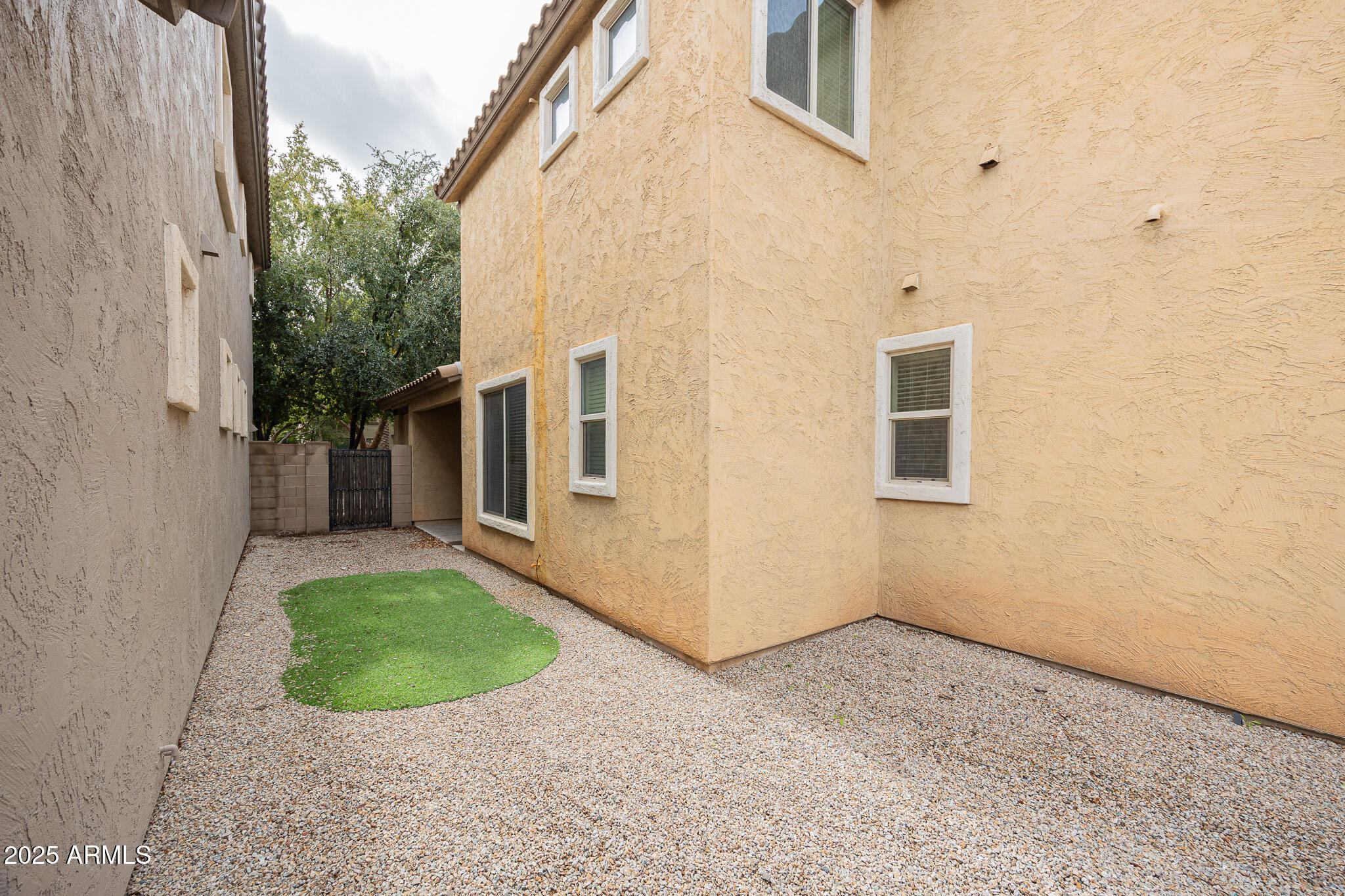 3314 East Sheffield Road Gilbert, AZ 85296 - Photo 31 of 31 a view of a back yard of the house