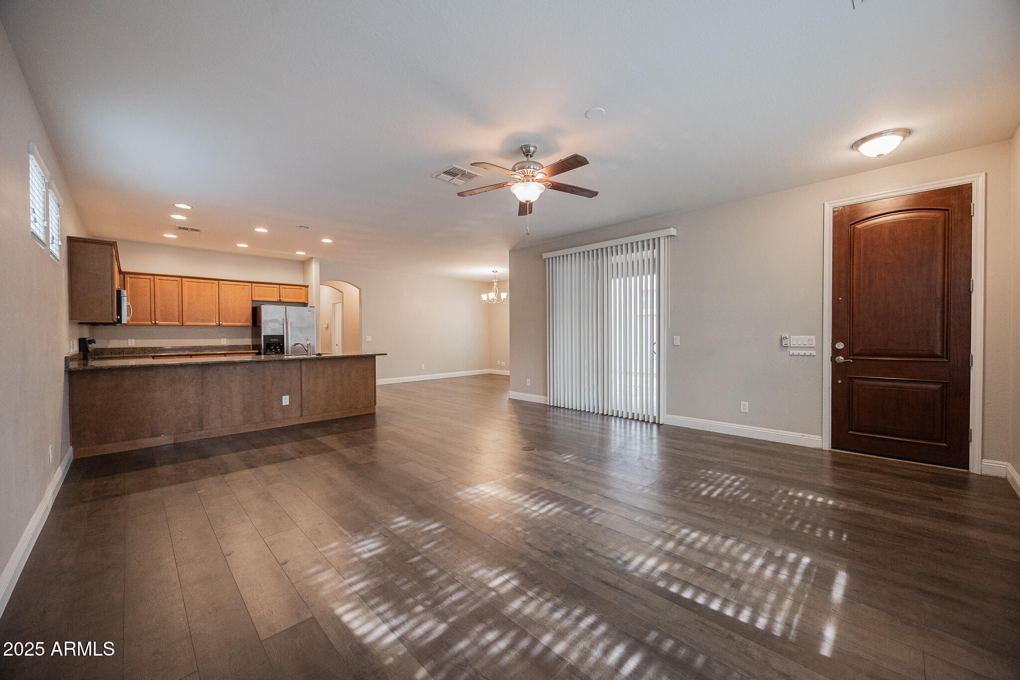 3314 East Sheffield Road Gilbert, AZ 85296 - Photo 4 of 31 a view of kitchen with refrigerator and a stove top oven