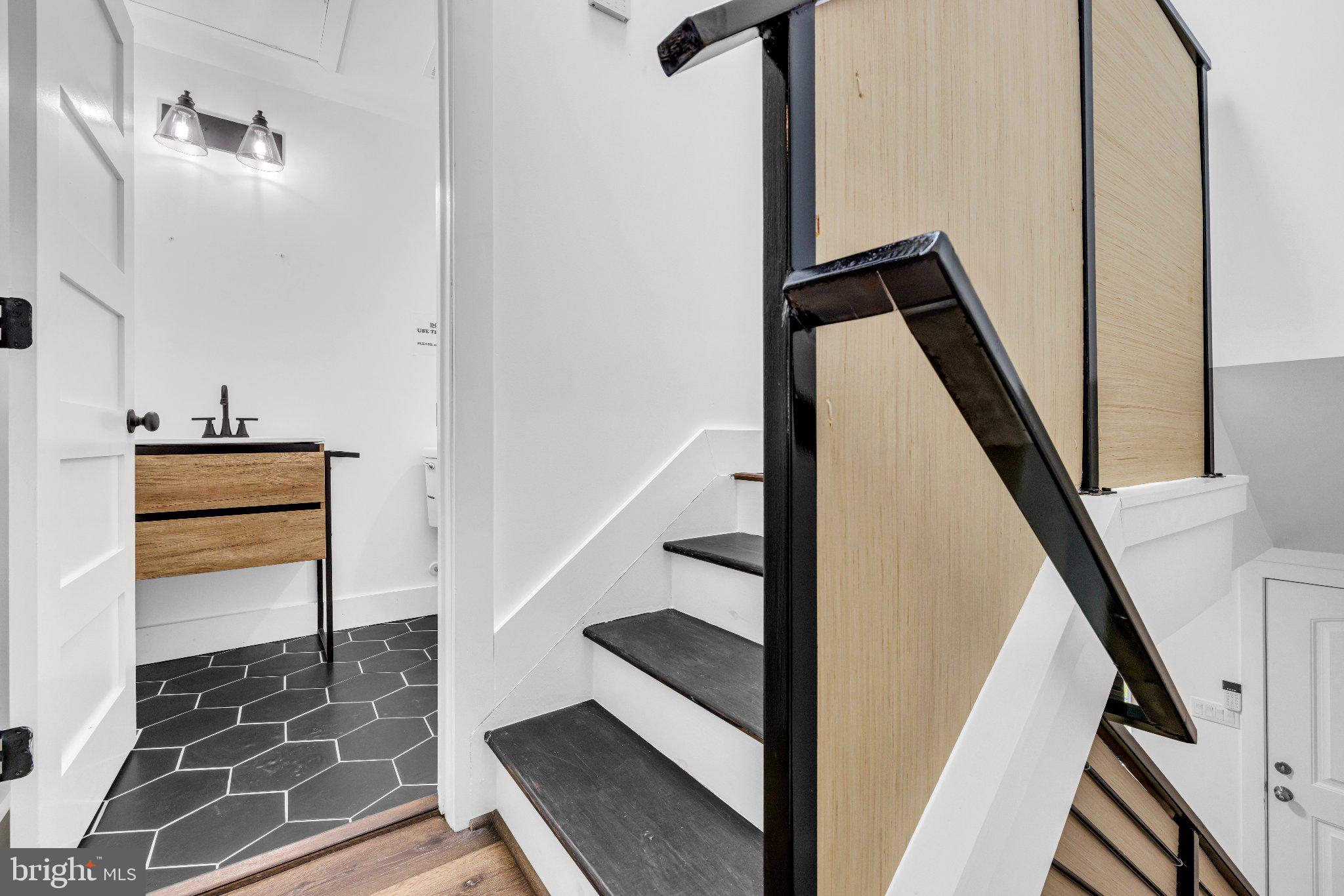 2731 Round Road Baltimore, MD 21225 - Photo 6 of 26 Modern staircase with sleek design.