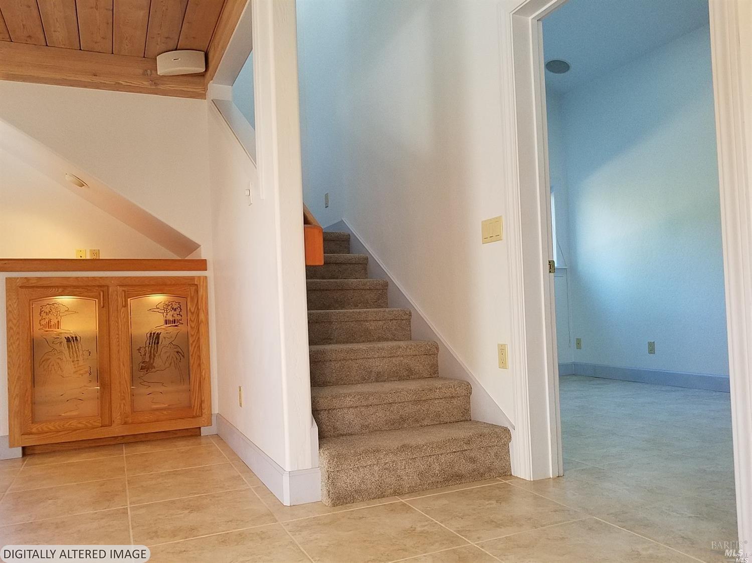 44005 Iversen Road Gualala, CA 95445 - Photo 9 of 18 Stairs to loft bedroom prior to tenant moving in.