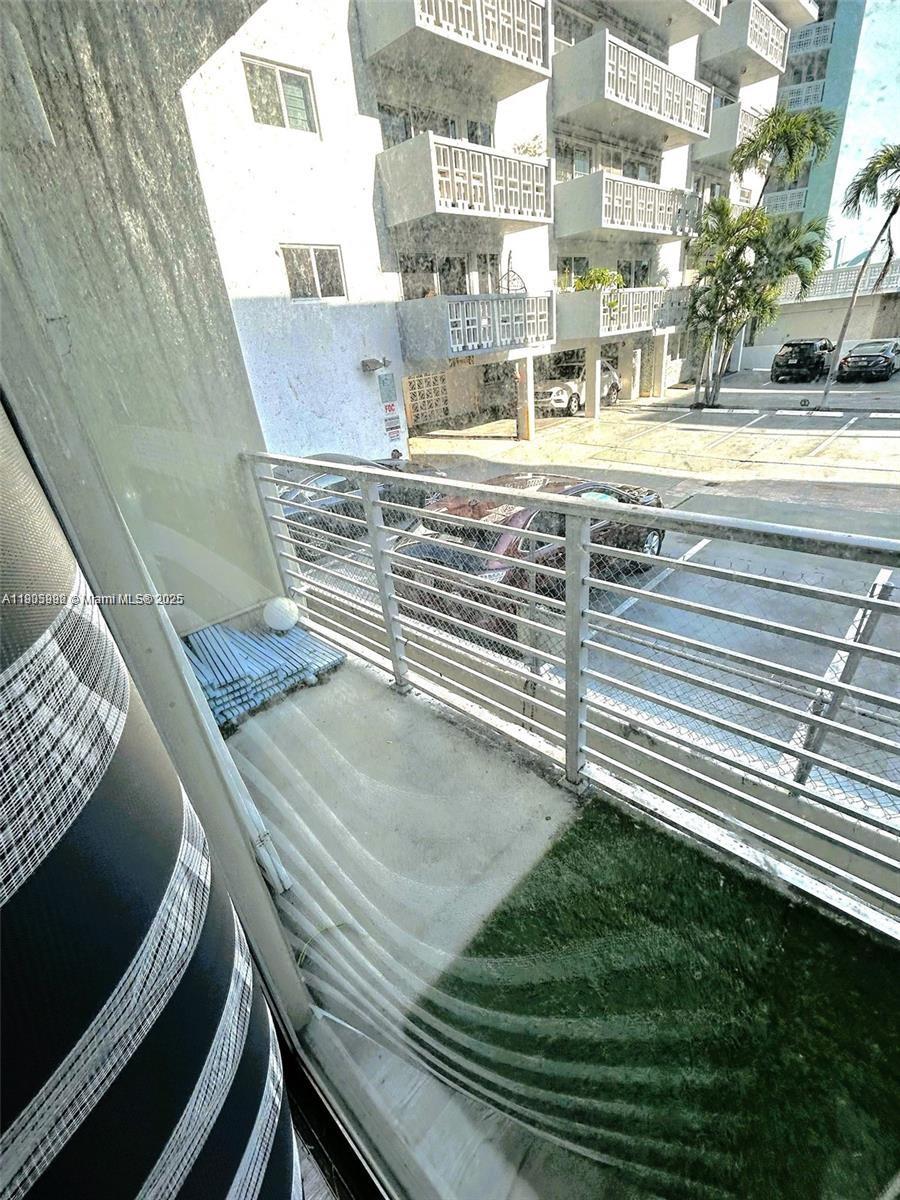 1441 Lincoln Road, Unit 217 Miami Beach, FL 33139 - Photo 13 of 15 a view of a balcony with yard