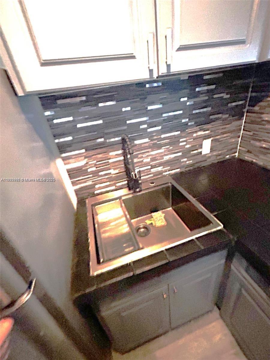 1441 Lincoln Road, Unit 217 Miami Beach, FL 33139 - Photo 4 of 15 a close view of sink