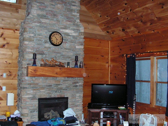 138 Sequoia Lane Boone, NC 28607 - Photo 20 of 26 view of living room with furniture and a fireplace