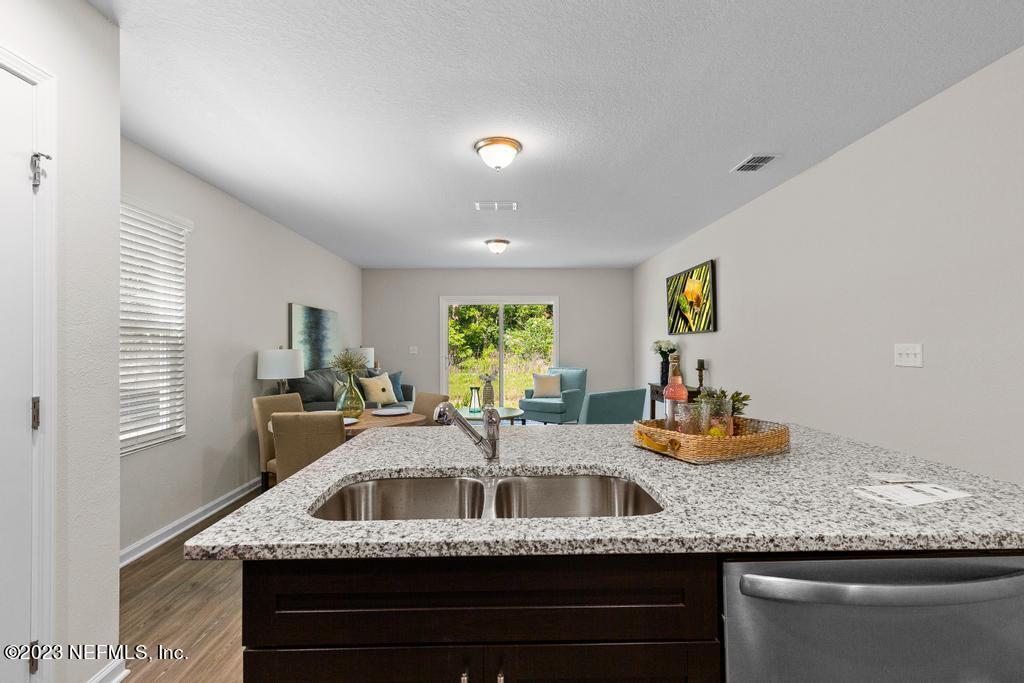 1330 Ellis Road South Jacksonville, FL 32205 - Photo 10 of 23 a kitchen with sink and window