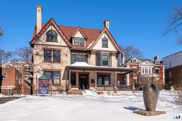 a view of a building with a street