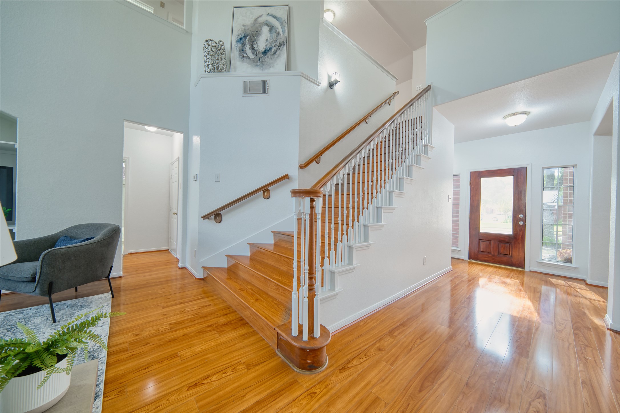 11115 Seminole Spring Lane Houston, TX 77089 - Photo 18 of 44 a view of entryway and hall with wooden floor