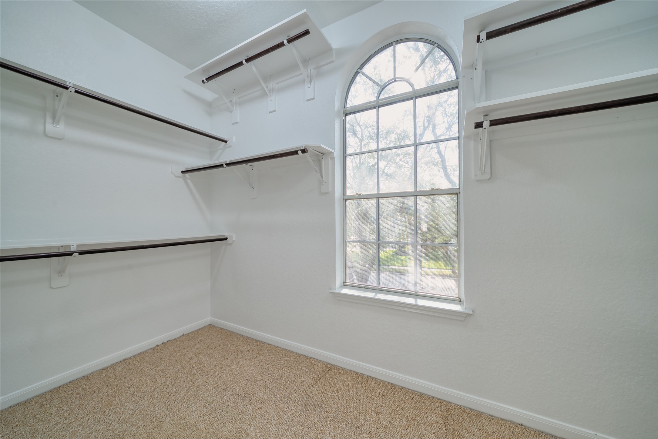 11115 Seminole Spring Lane Houston, TX 77089 - Photo 29 of 44 a view of an empty room with a window