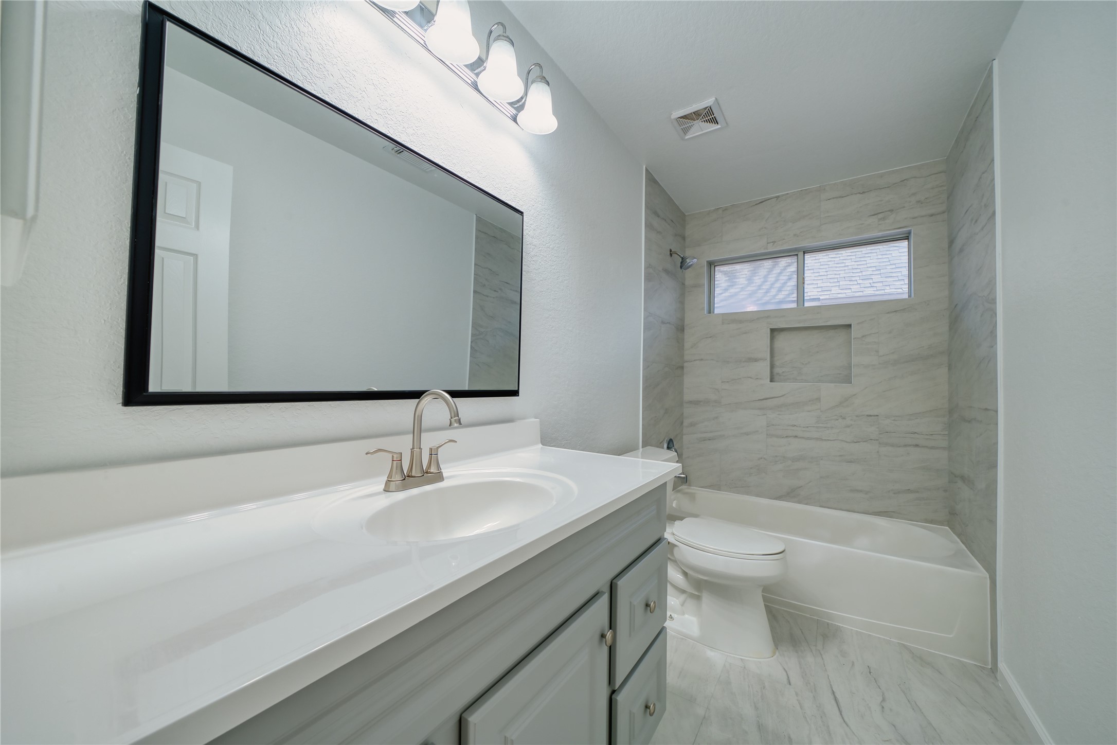 11115 Seminole Spring Lane Houston, TX 77089 - Photo 34 of 44 a bathroom with a sink a toilet and shower