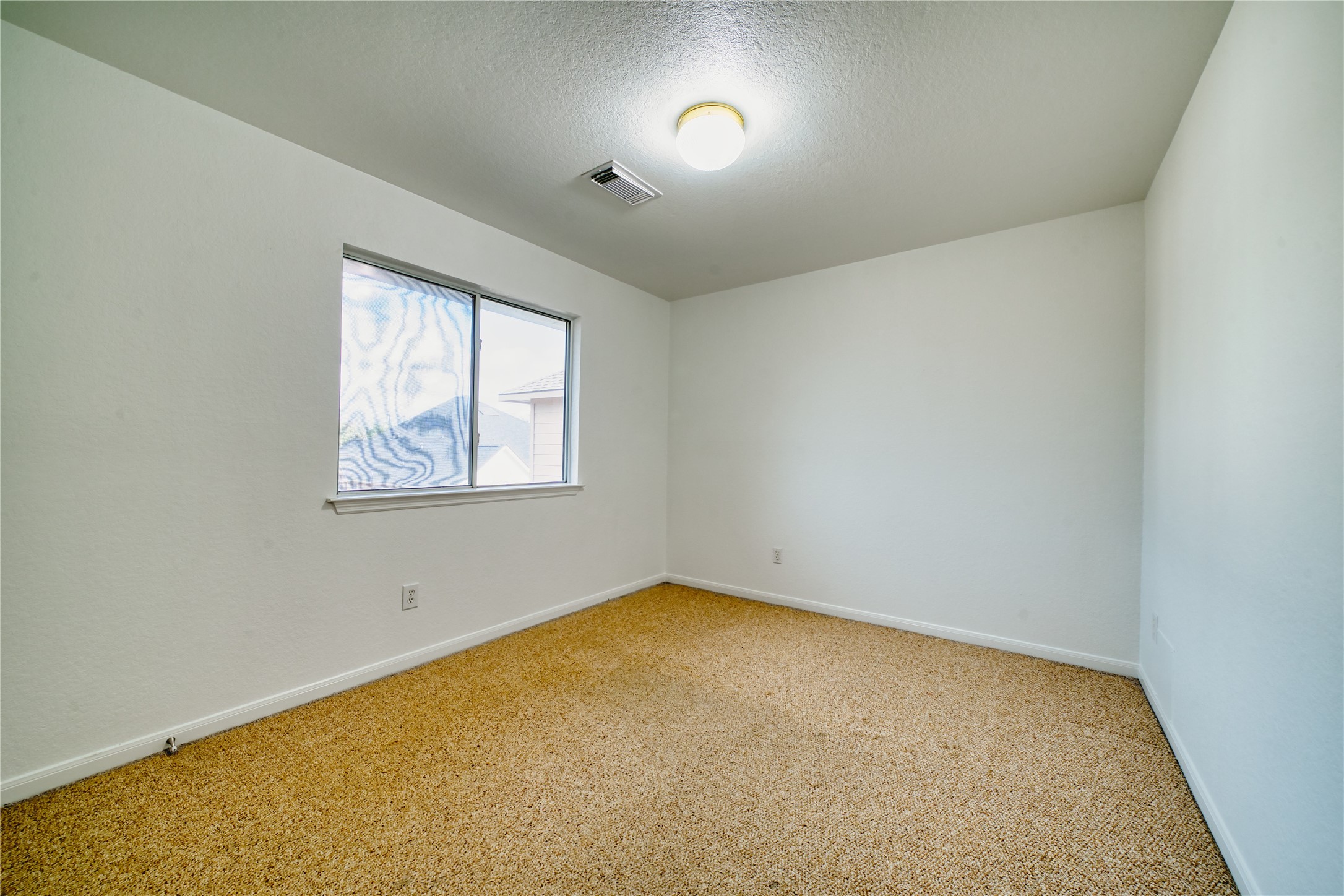 11115 Seminole Spring Lane Houston, TX 77089 - Photo 35 of 44 an empty room with windows