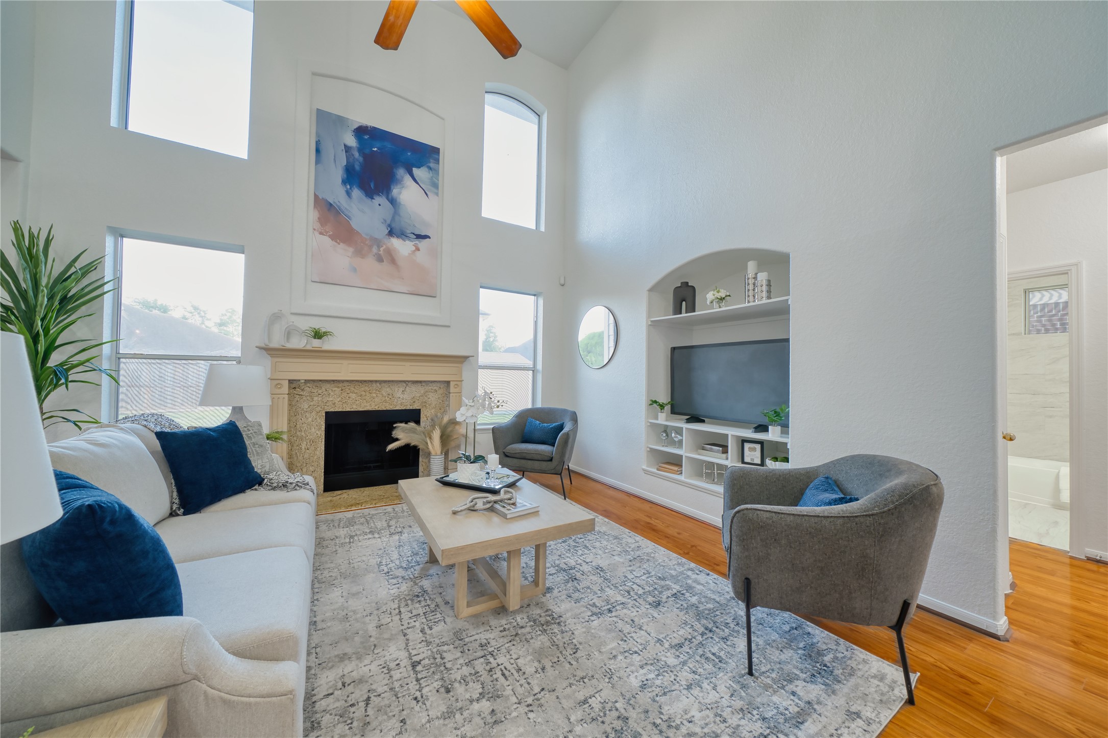 11115 Seminole Spring Lane Houston, TX 77089 - Photo 10 of 44 a living room with furniture and a fireplace