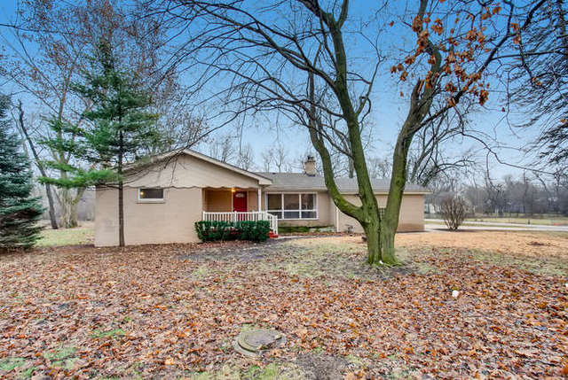 26W421 Geneva Road Wheaton, IL 60187 - Photo 2 of 29 a house that has a tree in front of it