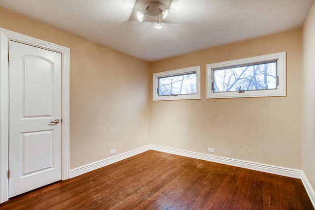 26W421 Geneva Road Wheaton, IL 60187 - Photo 18 of 29 a view of empty room with wooden floor