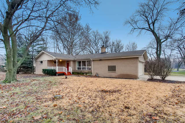 26W421 Geneva Road Wheaton, IL 60187 - Photo 3 of 29 a house that has a tree in front of it