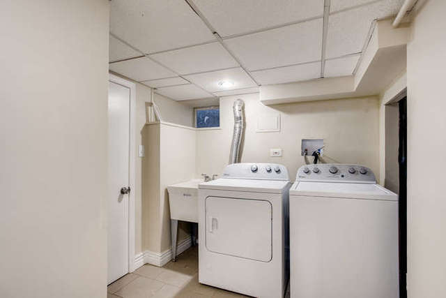 26W421 Geneva Road Wheaton, IL 60187 - Photo 25 of 29 a utility room with dryer and washer
