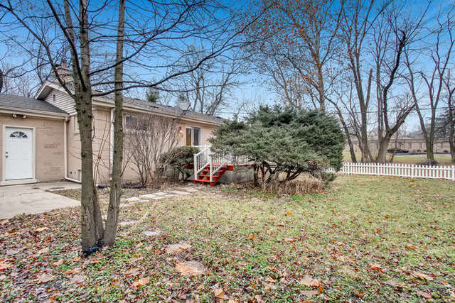 26W421 Geneva Road Wheaton, IL 60187 - Photo 27 of 29 a view of a yard with patio