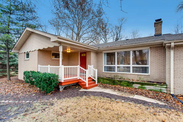 26W421 Geneva Road Wheaton, IL 60187 - Photo 5 of 29 a view of house with a yard