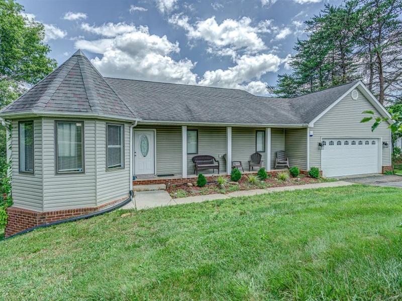 3460 Sterling Road Roanoke, VA 24014 - Photo 1 of 37 a front view of a house with patio and garden