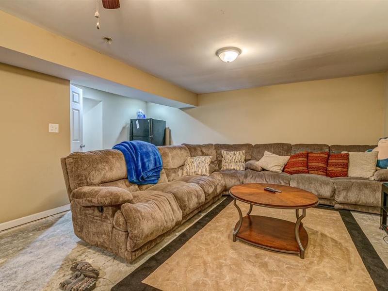 3460 Sterling Road Roanoke, VA 24014 - Photo 23 of 37 a living room with furniture and a rug
