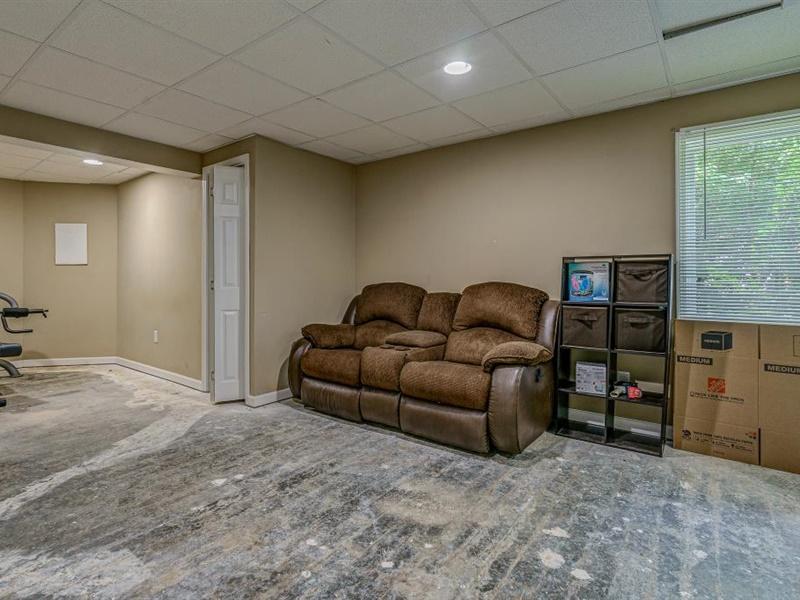 3460 Sterling Road Roanoke, VA 24014 - Photo 29 of 37 a living room with furniture a window and a couch