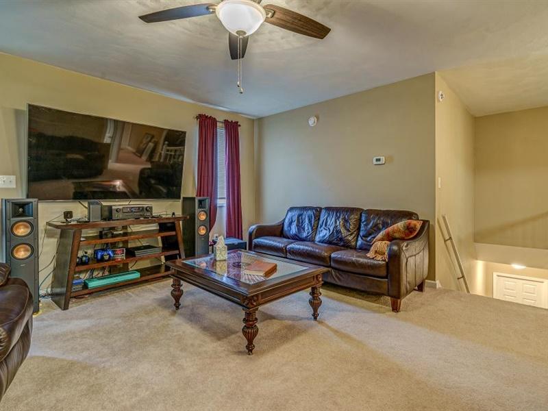 3460 Sterling Road Roanoke, VA 24014 - Photo 8 of 37 a living room with furniture and a flat screen tv
